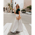 Flowy brown Victoria long skirt with high waist by Lumina Wear, featuring a relaxed silhouette and elegant design.