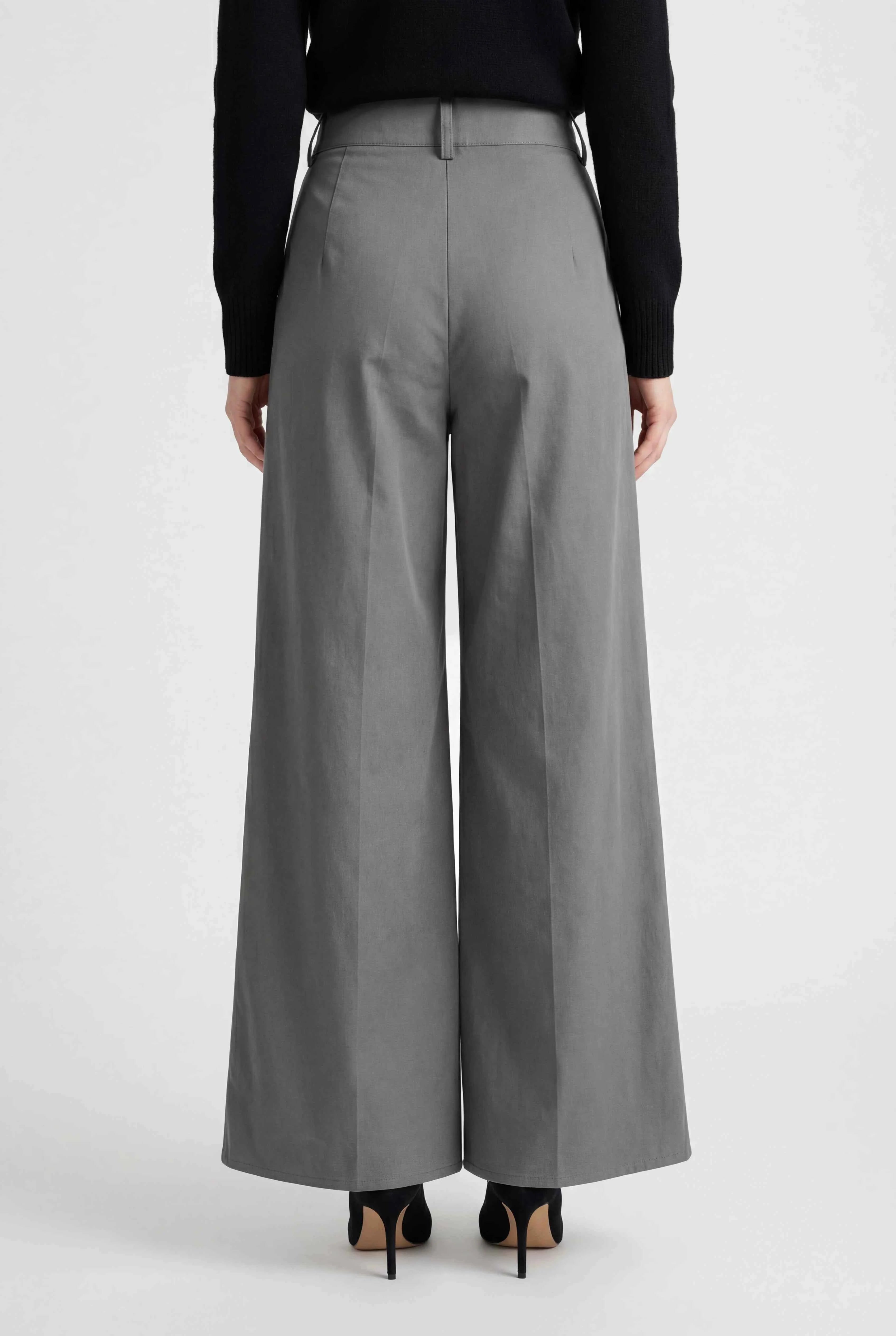 Gray Victoria Lumina Wear high-waist palazzo pants for women, flowy and stylish, shown on a model in a natural pose.