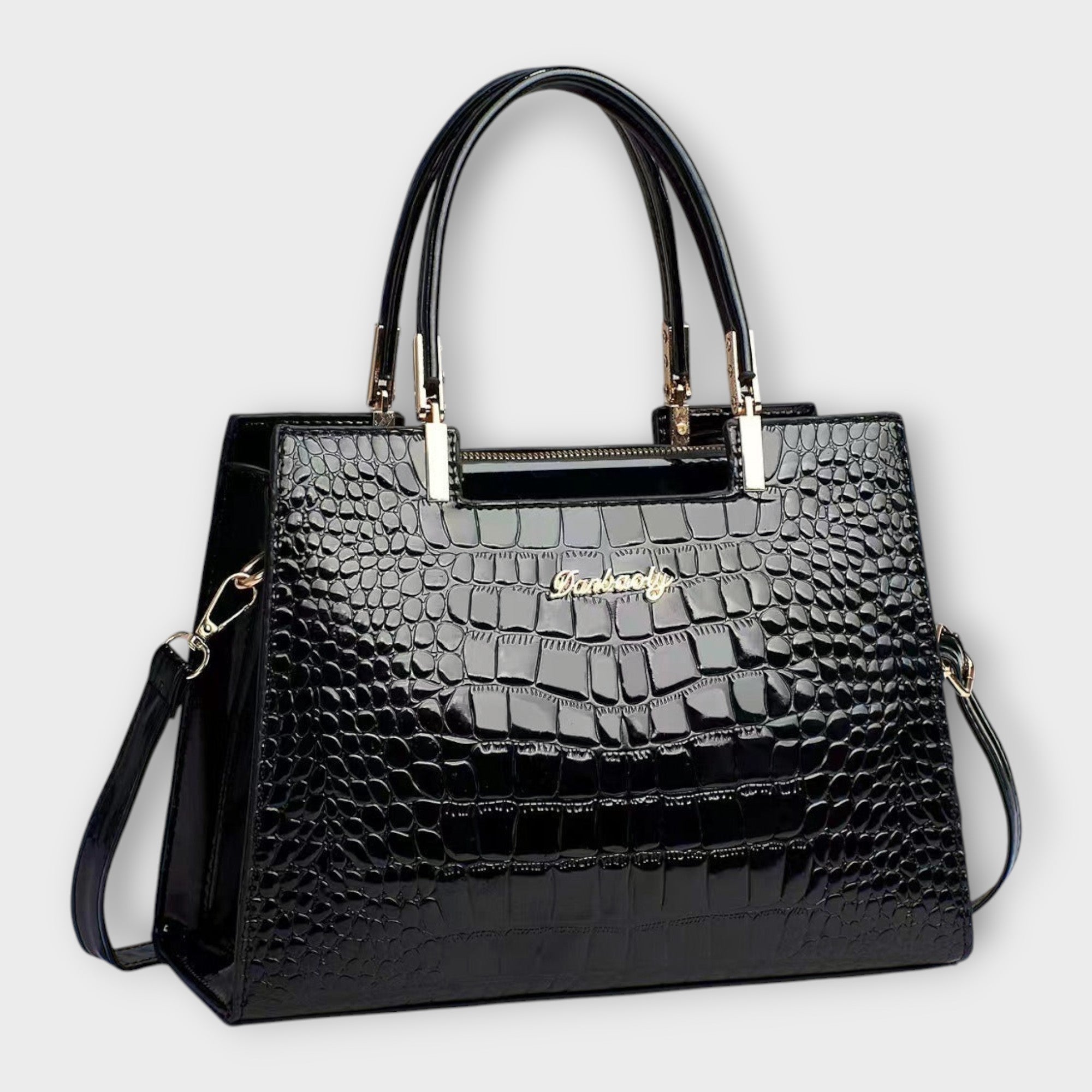 Black Victoria Lumina glossy crocodile pattern handbag with structured design, showcasing elegant craftsmanship and textured finish.