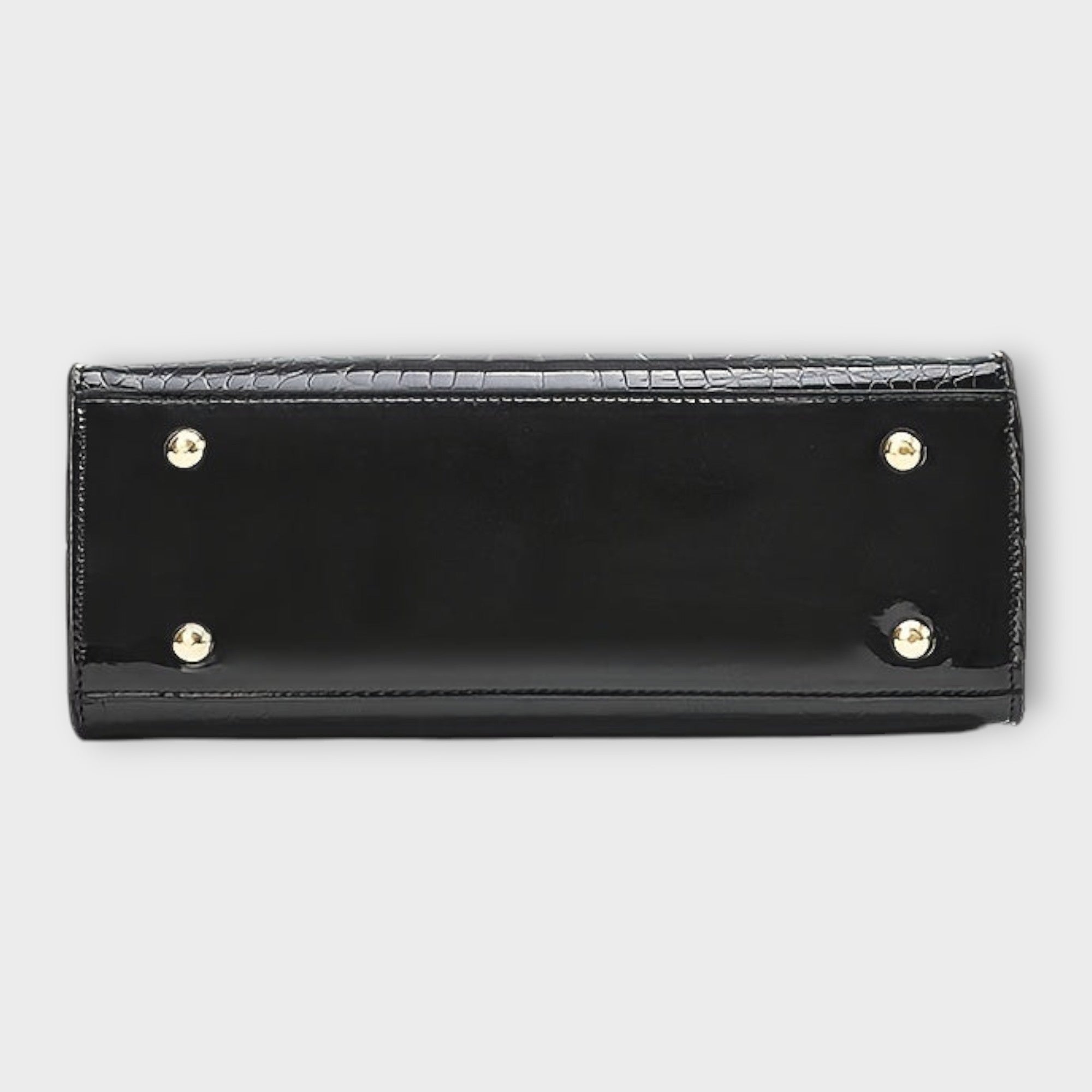 Black Victoria Lumina glossy crocodile pattern handbag with structured design, featuring top handles and elegant detailing.