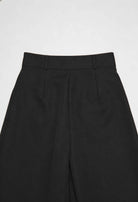 Black Victoria high-waisted wide-leg trousers by Lumina Wear, featuring an elegant fit and flowing silhouette.