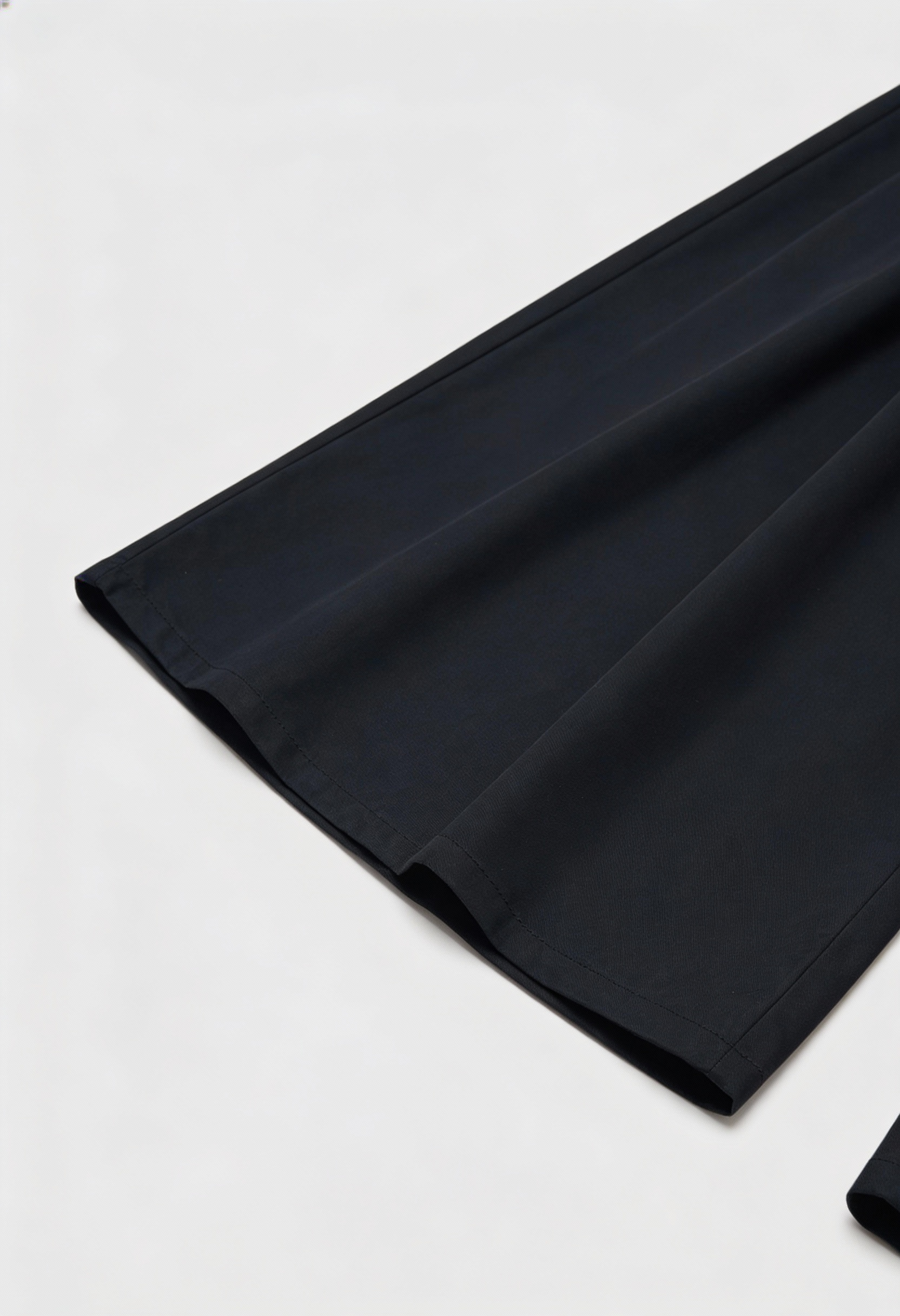 Black Victoria high-waisted wide-leg trousers from Lumina Wear, showcasing an elegant fit and relaxed, flowing silhouette.
