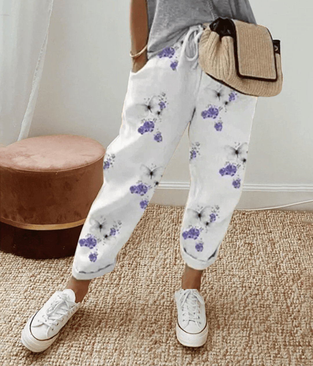 Lightweight beige casual trousers with relaxed fit from Lumina Wear, featuring subtle print detail and comfortable fabric.