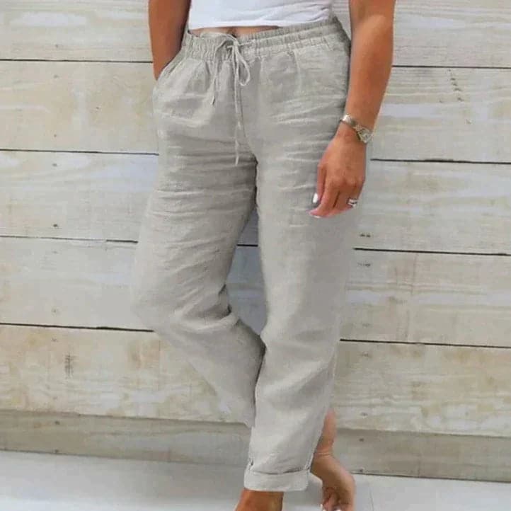 Light beige summer trousers with elastic waistband from Lumina Wear Victoria collection, lightweight and comfortable for warm weather.