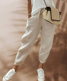 Lightweight black women's casual pants with elastic waist from Lumina Wear, featuring a comfortable fit and relaxed style.