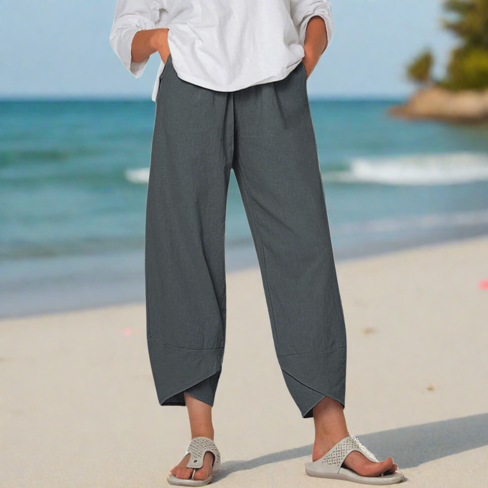 Victoria Lumina Wear lightweight relaxed fit white casual trousers displayed on model, showcasing comfortable, versatile pants.