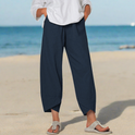 Victoria Lumina Wear lightweight relaxed fit white trousers, casual pants with a comfortable fit and versatile style.