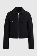 Black Victoria Lumina Wear modern cropped jacket with pockets, stylish and lightweight for casual wear.