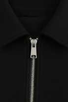 Black Victoria Lumina Wear modern cropped jacket with pockets, stylish and lightweight, perfect for casual wear.
