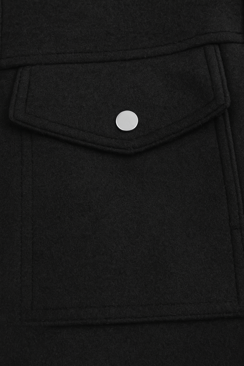 Black Victoria Lumina Wear modern cropped jacket with pockets, stylish and versatile outerwear for casual or semi-formal outfits.