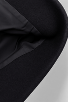 Black Victoria Lumina Wear modern cropped jacket with pockets, stylish and versatile for casual and outdoor wear.