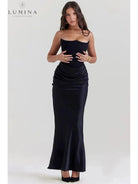 Victoria Noir satin black maxi dress by Lumina Vancouver, elegant wedding guest dress with sophisticated style and a flowing silhouette.