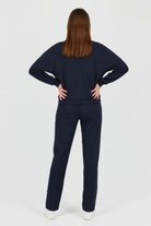 Victoria relaxed fit dark blue activewear set by Lumina Wear, includes sweatpants and sweatshirt with zipper accents.