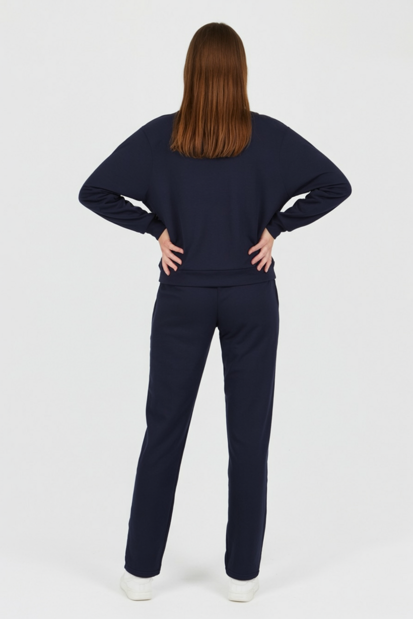 Victoria relaxed fit dark blue activewear set by Lumina Wear, includes sweatpants and sweatshirt with zipper accents.