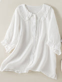 Blue Victoria relaxed fit ruffle collar top by Lumina Wear, perfect for effortless summer style, worn by a woman.