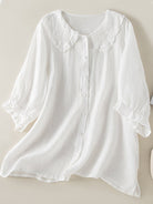 Blue Victoria women's top with a relaxed fit and ruffle collar, perfect for effortless summer style by Lumina Wear.