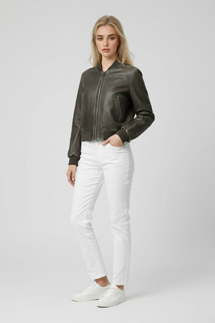 Victoria Lumina black retro-inspired bomber jacket with modern comfort, shown on a model with a casual urban background.