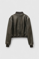 Black Victoria bomber jacket by Lumina Wear featuring retro-inspired design and modern comfort, showcased on a hanger.