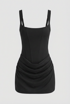 Victoria black mini dress by Lumina Wear, sculpted fit with hourglass silhouette, shown in a stylish dress image.