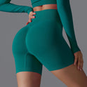 Olive green Victoria seamless high-waisted training shorts by Lumina Wear, designed for activewear and workout comfort.