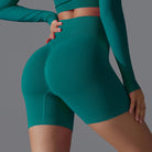 Olive green Victoria seamless high-waisted training shorts for women by Lumina Wear, designed for activewear and workout comfort.