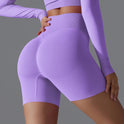 Victoria seamless high-waisted training shorts by Lumina Wear in olive for women’s activewear, shown on a model.