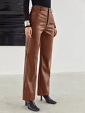 Victoria Lumina Wear slim fit black leather trousers for women with soft finish, shown on a model.