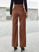 Victoria Lumina slim fit black leather trousers for women with soft finish, showcasing a sleek, tailored look and soft leather texture.