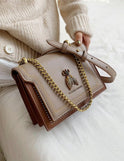 Lumina Victoria structured chain handbag in khaki with elegant detailing and chic accents, stylish for any occasion.