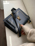 Lumina Wear Victoria structured chain bag in khaki with elegant design and chic detailing, ideal for stylish occasions.