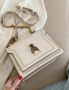 Khaki Victoria Lumina structured chain handbag with elegant detailing, showcasing a chic and sophisticated design.