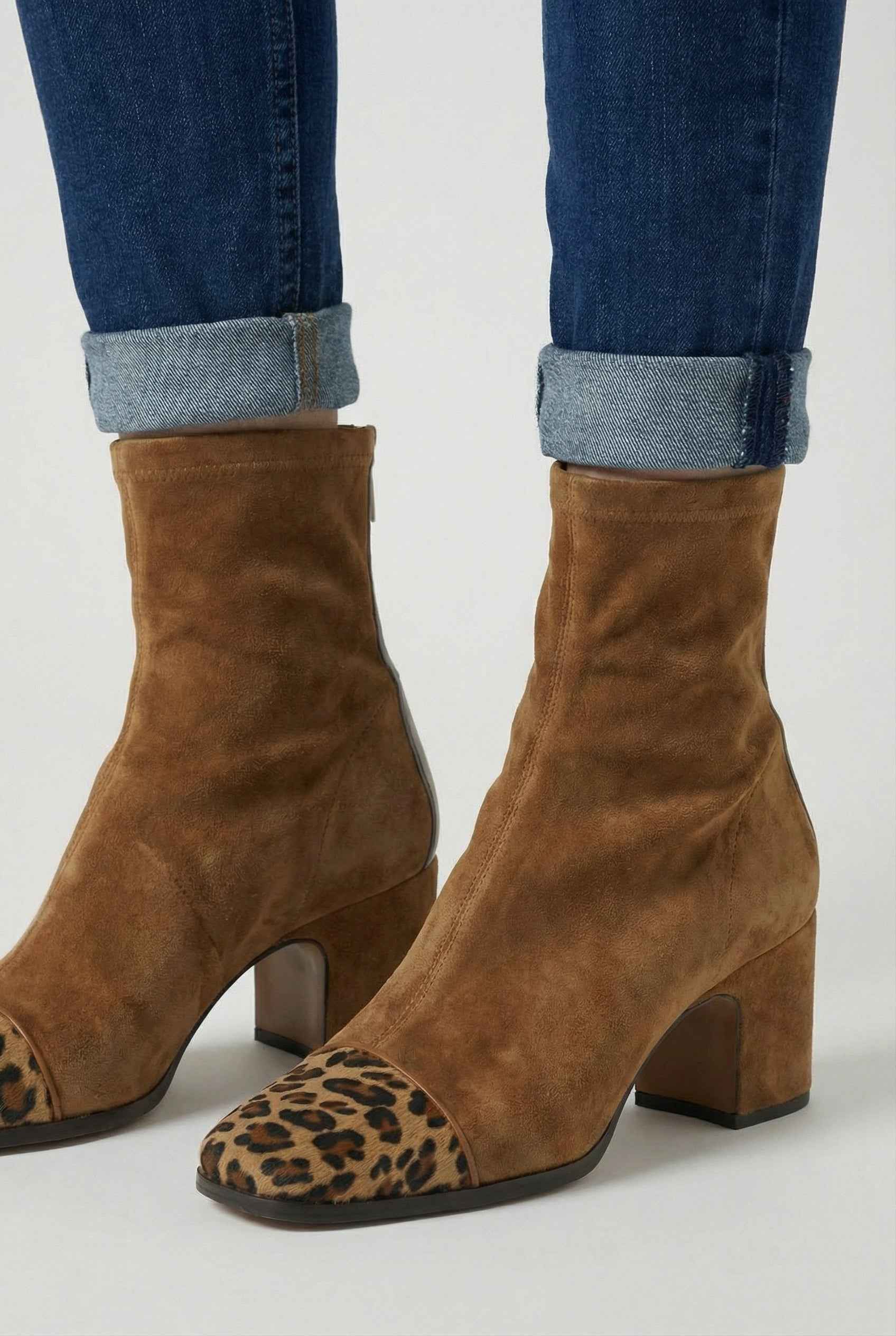 Stylish brown mid-calf women's boots with lace detail from Lumina Wear, featuring a sleek design and comfortable fit.