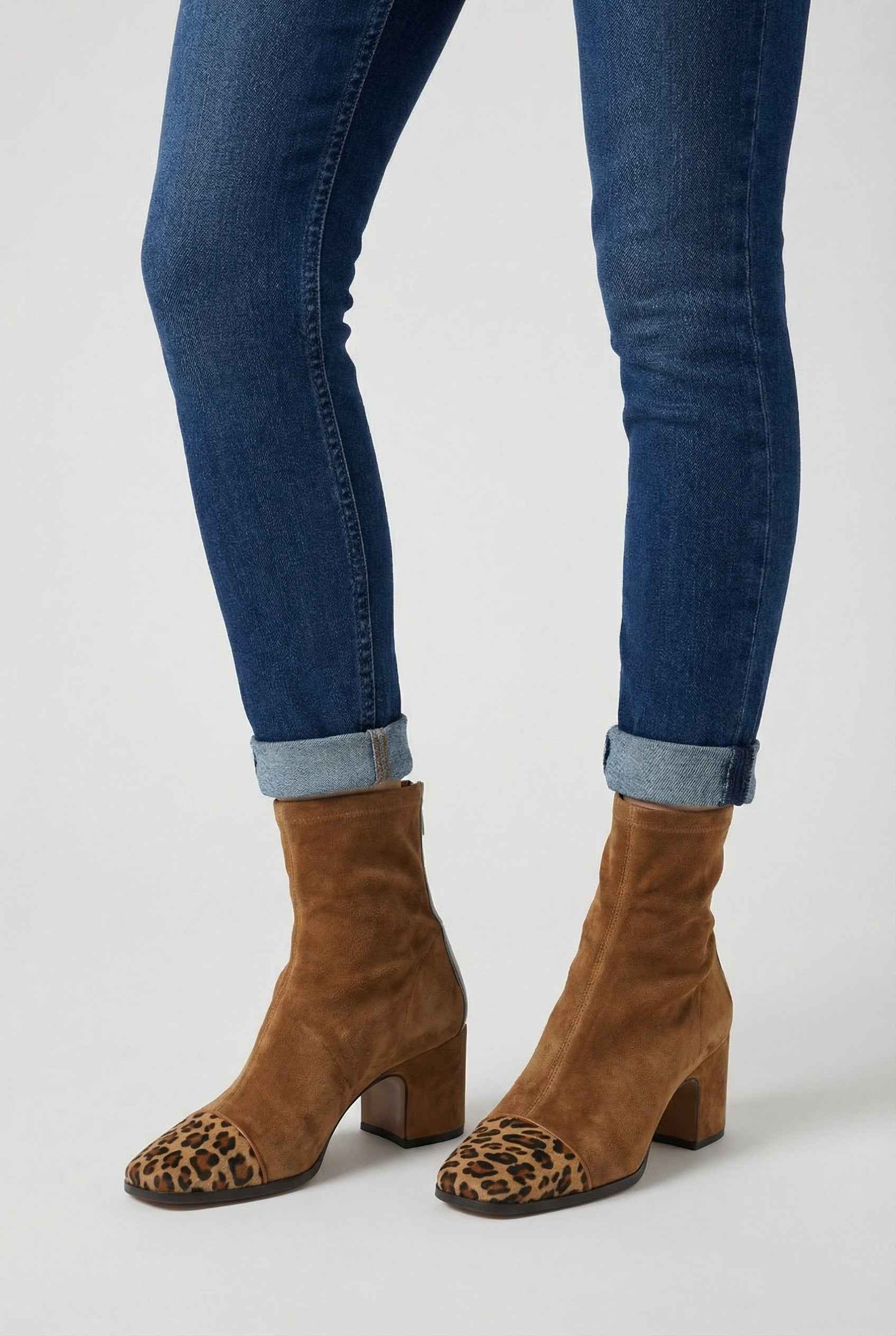 Stylish brown mid-calf women's boots with lace detail by Lumina Wear, featuring a sleek design and comfortable fit.