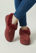 Victoria women's burgundy winter boots by Lumina Wear with warm lining, stylish design, and sturdy soles for cold weather comfort.