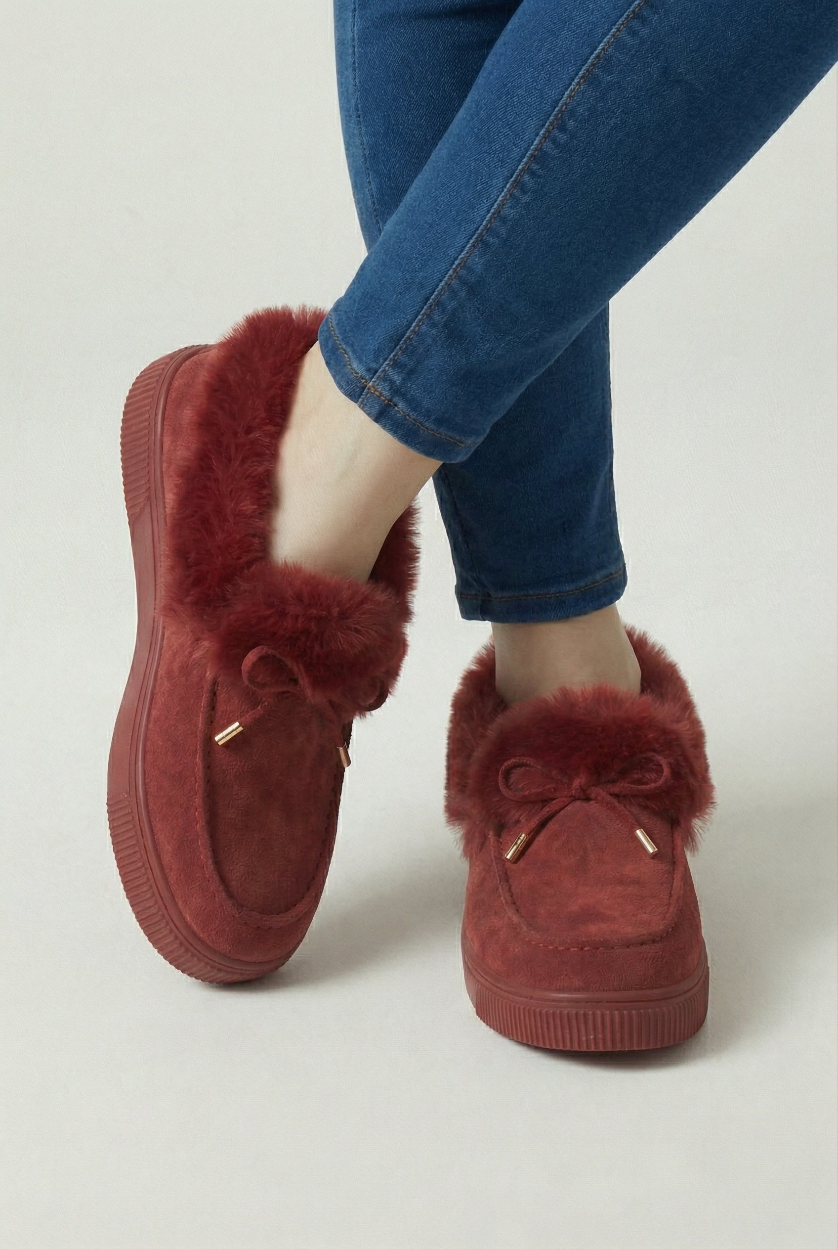 Victoria women's burgundy winter boots by Lumina Wear with warm lining, stylish design, and sturdy soles for cold weather comfort.