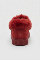 Stylish burgundy Lumina Wear women's winter boots with warm lining and lace-up design, perfect for cold weather.