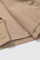 Lumina Wear Victoria women's khaki windbreaker with double-breasted design, stylish lightweight jacket for women.
