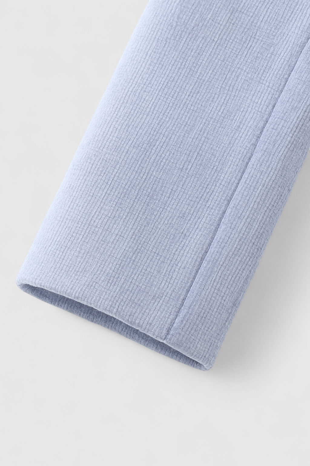 Light blue Victoria women's short jacket by Lumina Wear, featuring a stylish, versatile design for casual and layered looks.