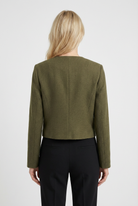 Olive green women's short jacket by Lumina Wear, featuring versatile design and stylish fit, perfect for casual and layered looks.