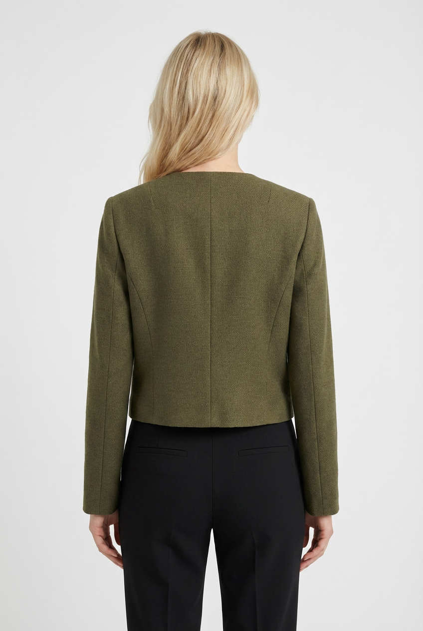 Olive green women's short jacket by Lumina Wear, featuring versatile design and stylish fit, perfect for casual and layered looks.