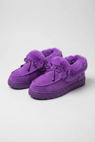 Lumina Wear Victoria purple winter boots with a stylish design and comfortable fit, featuring a cozy interior and sturdy sole.