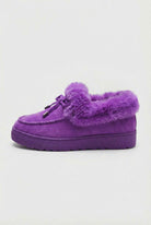 Lumina Wear Victoria purple winter boots with stylish design and comfortable fit, featuring a cozy winter-ready look.