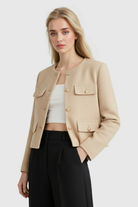 Women's Victoria champagne short jacket with tailored fit and cozy design from Lumina Wear, perfect for stylish layering.