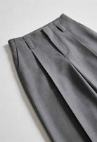 Victoria Lumina Wear tailored gray pleated trousers with stretch comfort, featuring a classic fit and stylish design.