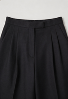 Victoria Lumina high-waisted black women's trousers with tailored fit and comfort, featuring a sleek, modern design.