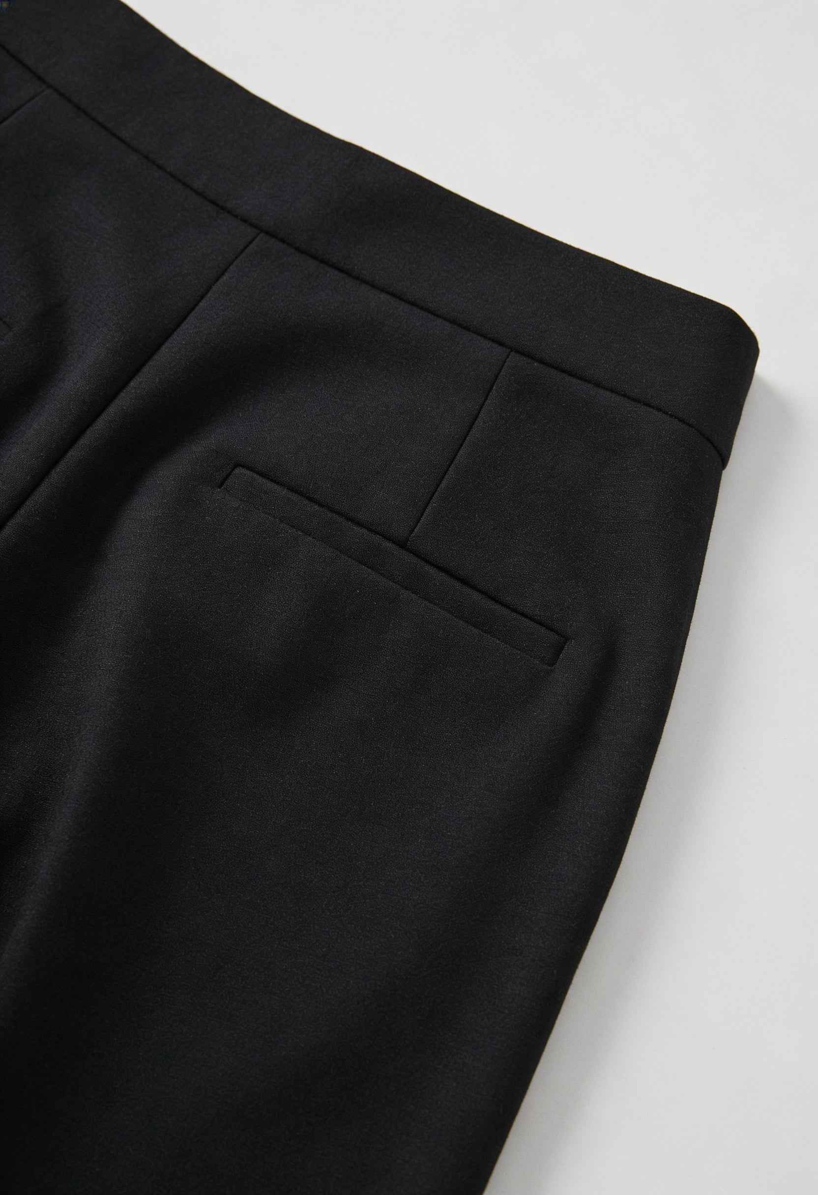Victoria Lumina women's high-waisted black trousers with a tailored fit and comfortable design, perfect for stylish office wear.