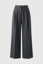 Victoria Lumina high-waisted gray trousers with elegant draping, tailored fit, and slim silhouette, perfect for sophisticated office wear.