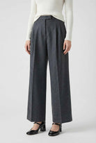Victoria high-waisted gray trousers by Lumina Wear with elegant draping, tailored fit, and sophisticated style.