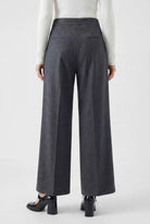 Victoria high-waisted gray trousers by Lumina Wear featuring tailored fit and elegant draping, shown on a model.