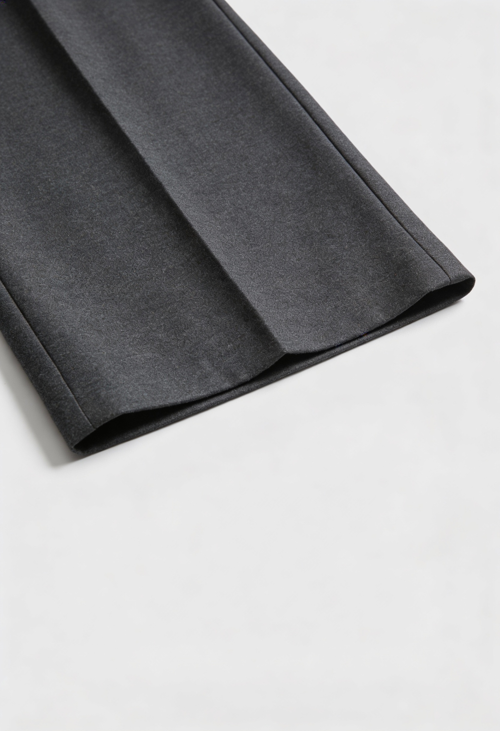 Victoria Lumina gray high-waisted tailored trousers with elegant draping, showcasing a sleek fit and sophisticated style.